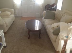 The original table. Too big and the color simply doesn't match the rest of the downstairs.